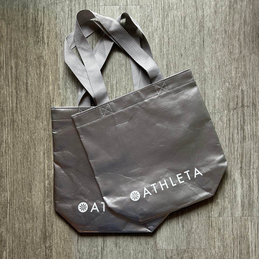 Athleta Set of 2 Silver Recycled Plastic Woven Straps Flat Bottom Reusable Totes